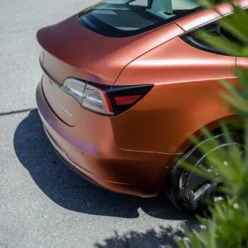 Tesla Model 3 Wrapped in Russet Red