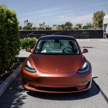 Tesla Model 3 Wrapped in Russet Red