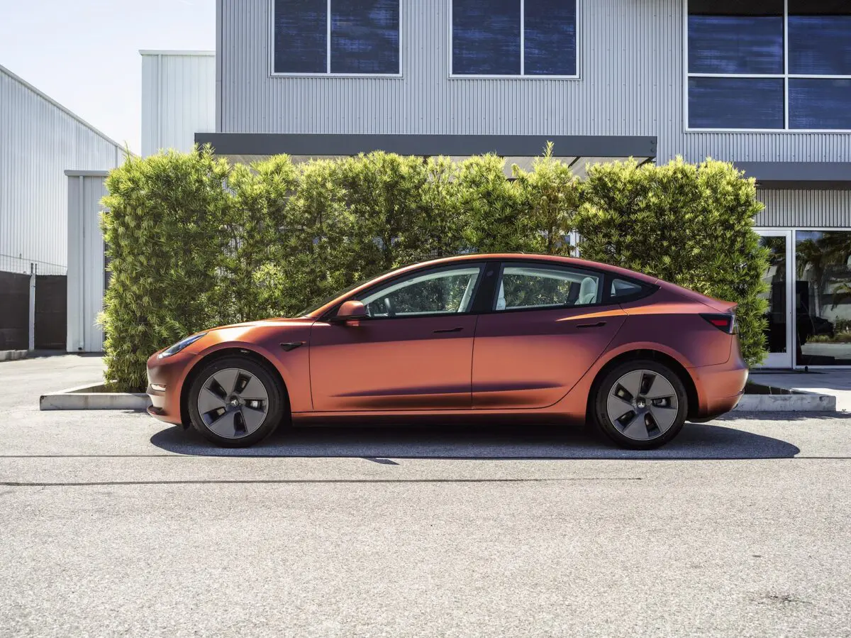 Tesla Model 3 Wrapped in Russet Red