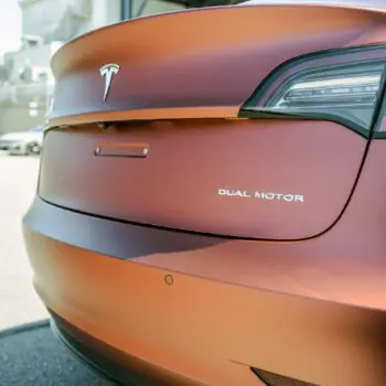 Tesla Model 3 Wrapped in Russet Red