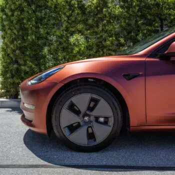 Tesla Model 3 Wrapped in Russet Red