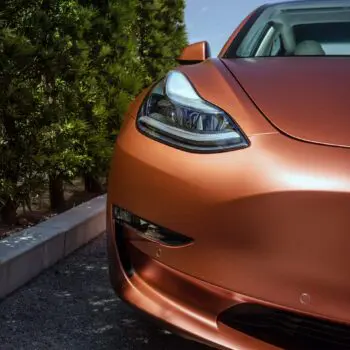 Tesla Model 3 Wrapped in Russet Red