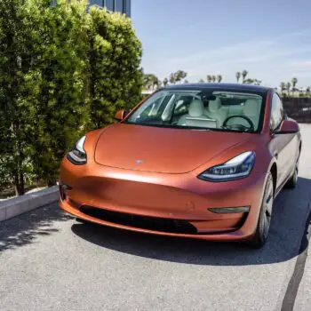 Tesla Model 3 Wrapped in Russet Red