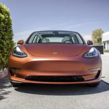 Tesla Model 3 Wrapped in Russet Red