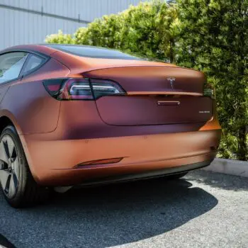 Tesla Model 3 Wrapped in Russet Red