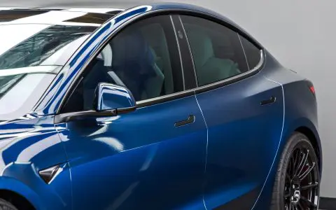 Tesla Highland Model 3 Performance - olor-change vinyl wrap, nano-ceramic window tint, ceramic coating