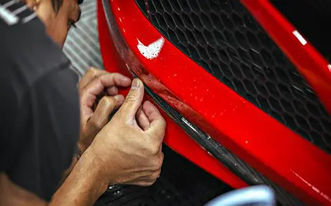 Honda NSX / Audi R8 Duo - XPEL Ultimate Plus PPF on front carbon fiber lip