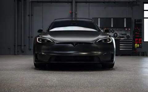 Satin Black Model S - Full vehicle color-change vinyl wrap, Window tint and Emblem blackout