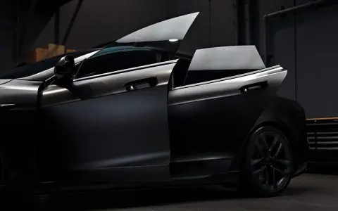 Satin Black Model S - Full vehicle color-change vinyl wrap, Window tint and Emblem blackout