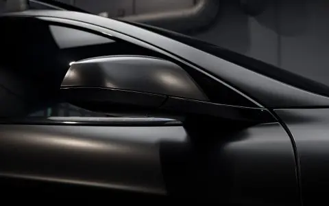 Satin Black Model S - Full vehicle color-change vinyl wrap, Window tint and Emblem blackout