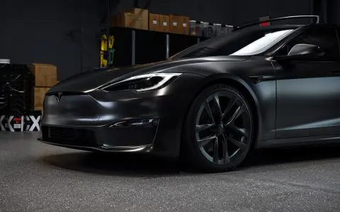 Satin Black Model S - Full vehicle color-change vinyl wrap, Window tint and Emblem blackout