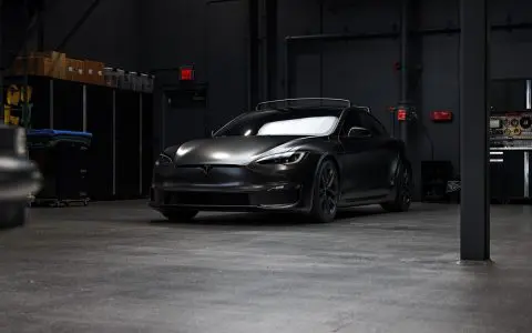Satin Black Model S - Full vehicle color-change vinyl wrap, Window tint and Emblem blackout