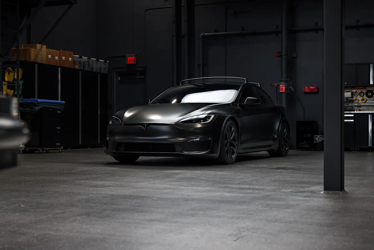 Satin Black Model S – Full vehicle color-change vinyl wrap, Window tint and Emblem blackout