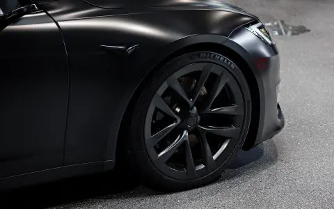 Satin Black Model S - Full vehicle color-change vinyl wrap, Window tint and Emblem blackout