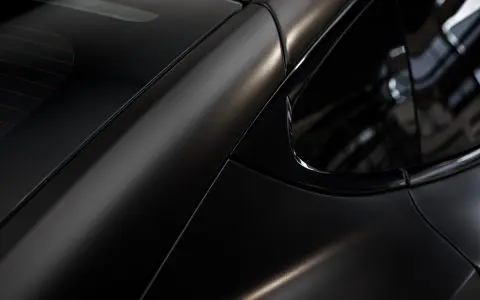 Satin Black Model S - Full vehicle color-change vinyl wrap, Window tint and Emblem blackout