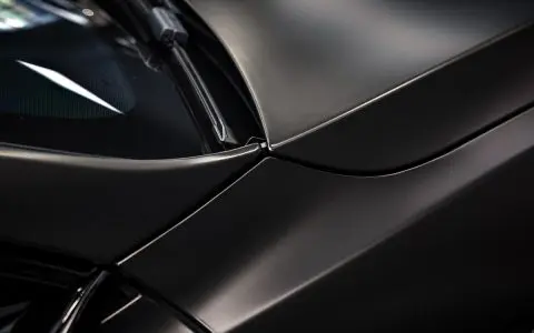 Satin Black Model S - Full vehicle color-change vinyl wrap, Window tint and Emblem blackout