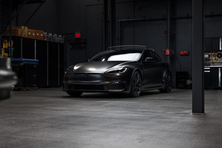 Satin Black Model S – Full vehicle color-change vinyl wrap, Window tint and Emblem blackout
